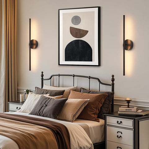 Modern bedroom with a bed, nightstands, and wall art.