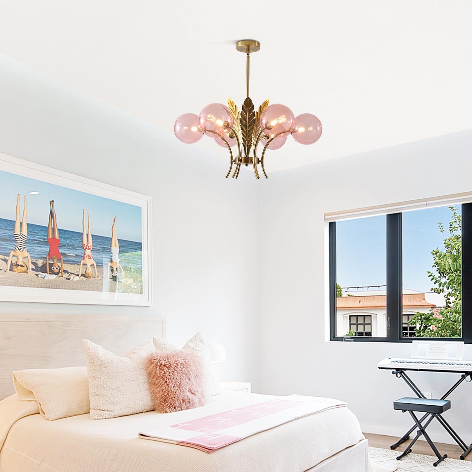 Modern living room with a chandelier, sofa, and wall art.