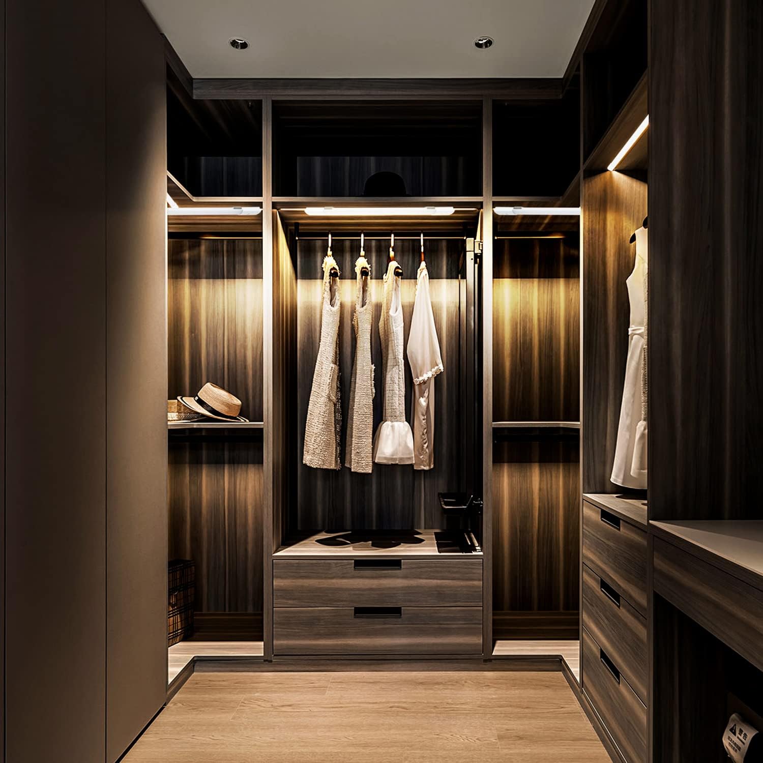 Modern walk-in closet with wooden shelves and clothing