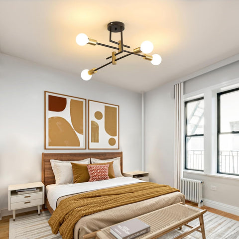 Modern bedroom with a ceiling light fixture, bed, and abstract art on the wall.