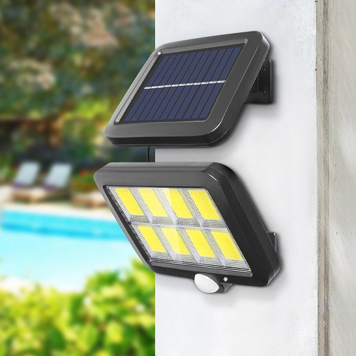 Solar-powered garden light lighting up a driveway at night with automatic motion activation

