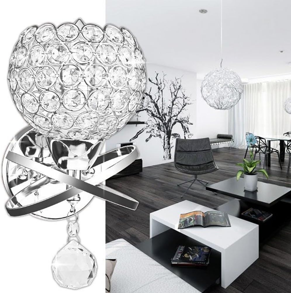 Heart-shaped crystal wall light fixture in a modern living room setting.