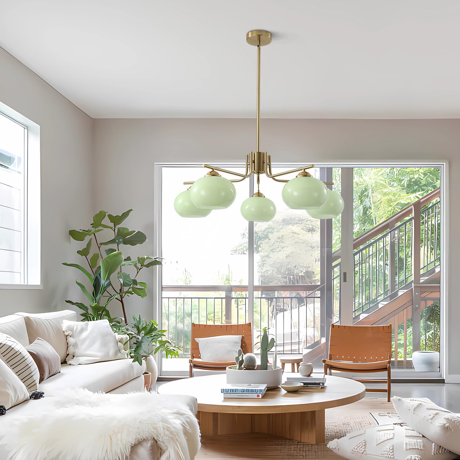Modern living room with a chandelier, sofa, coffee table, and chairs.