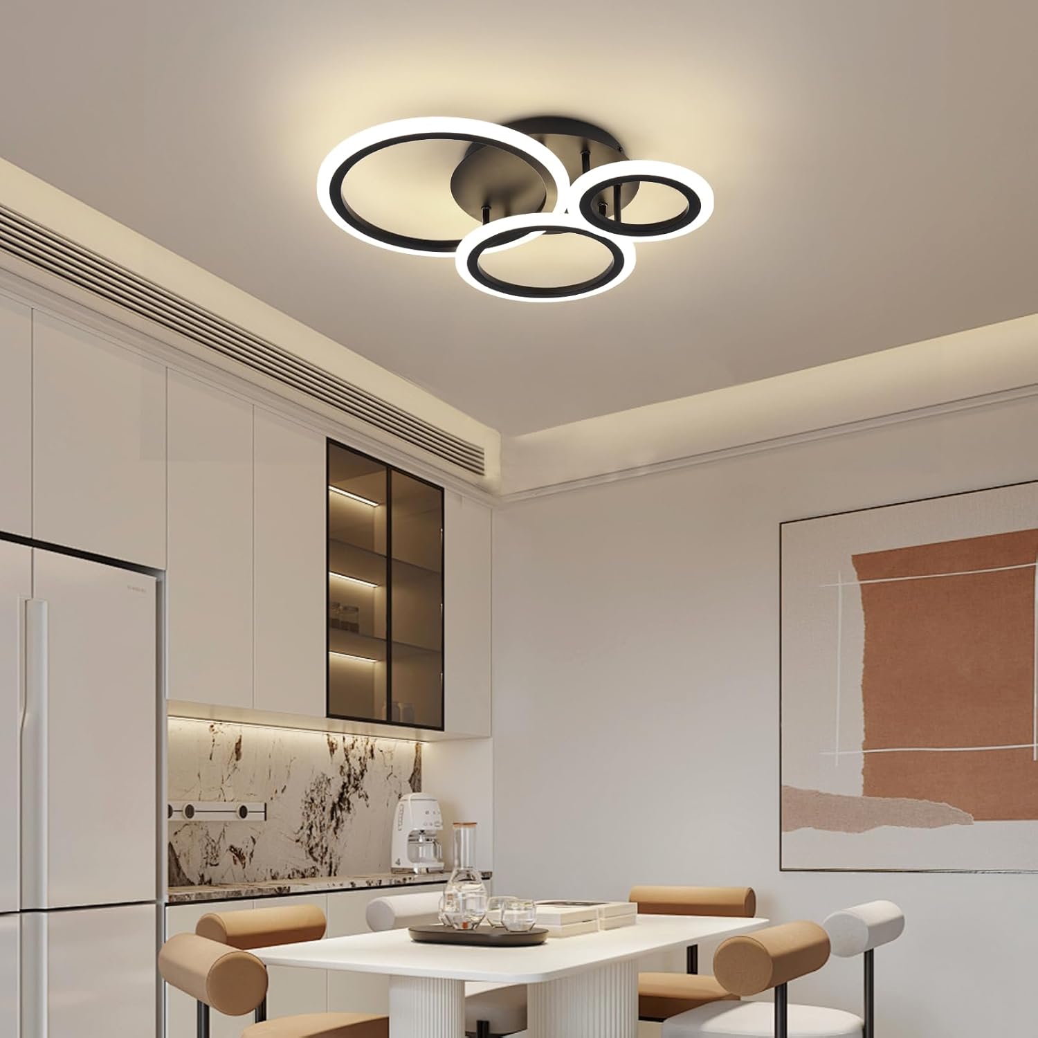 Modern ceiling light fixture in a kitchen setting with neutral tones.