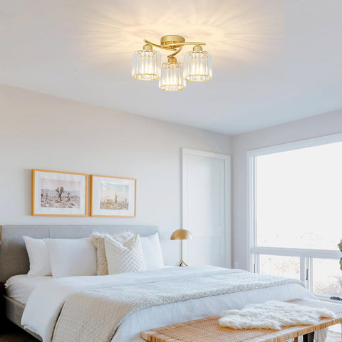 Modern bedroom with a ceiling light fixture, bed, and window.