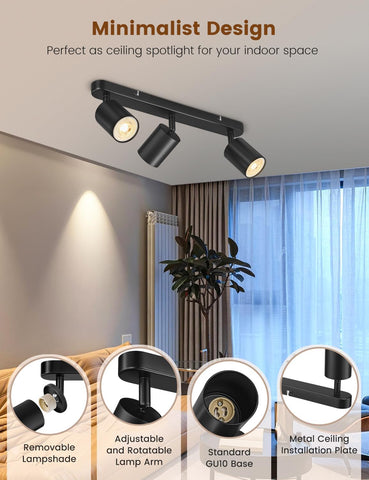 Ceiling spotlight with adjustable lamp arm and removable lampshade in a room setting.