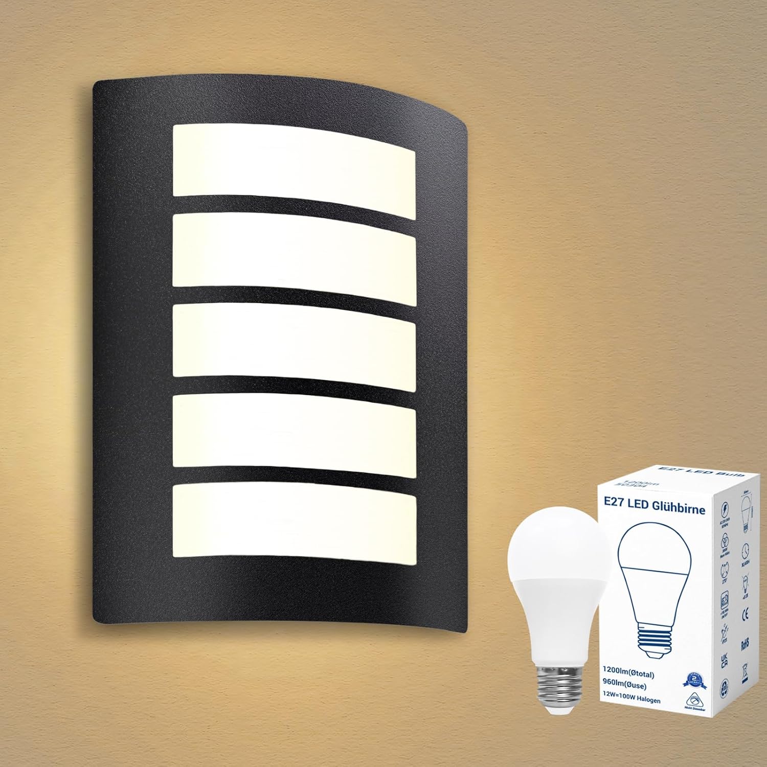 Black outdoor wall light fixture with a white LED bulb and packaging on a beige background