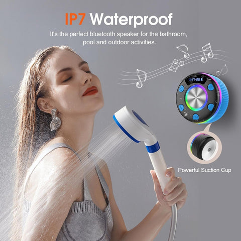 Waterproof Bluetooth speaker with suction cup held by a woman under shower, on gray background.