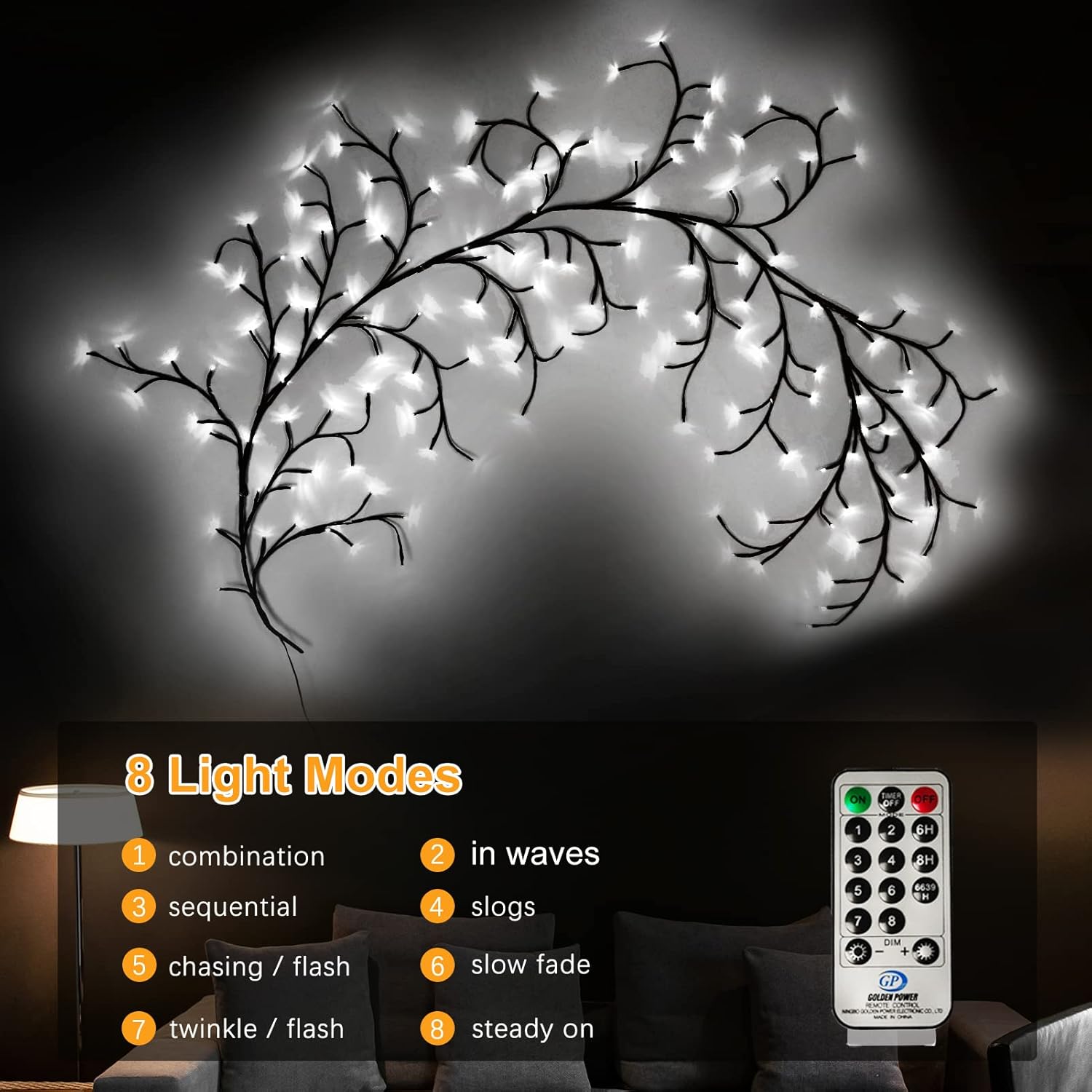 Decorative light fixture with branches and remote control on a dark background