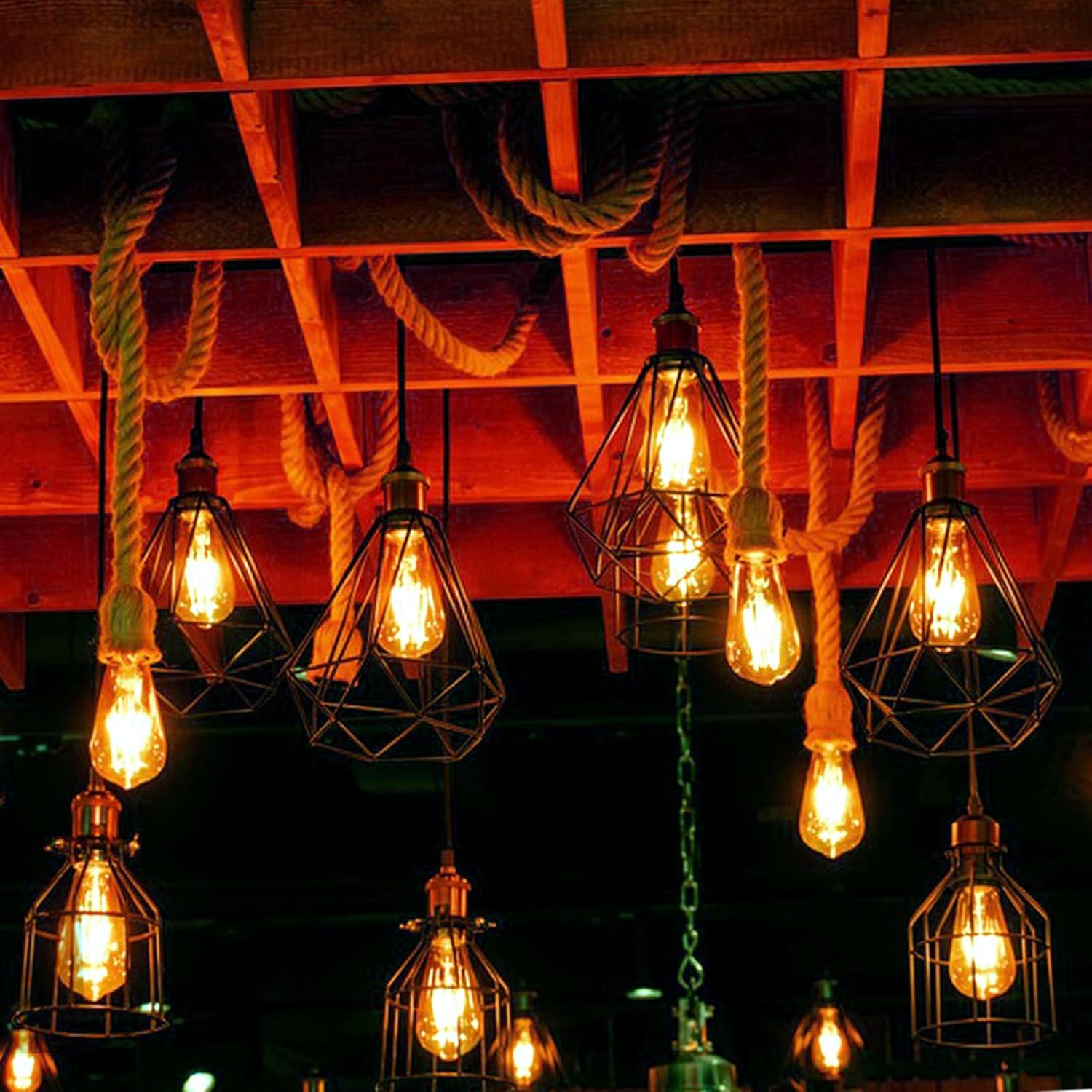 Vintage-style light bulbs hanging from a wooden ceiling