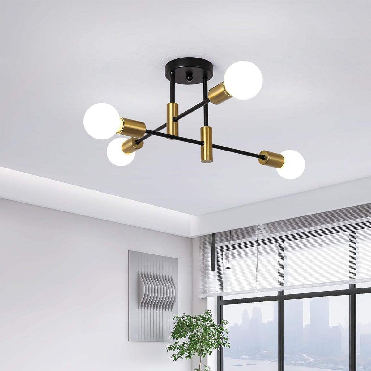 Modern ceiling light fixture with gold and black design in a room with large windows.