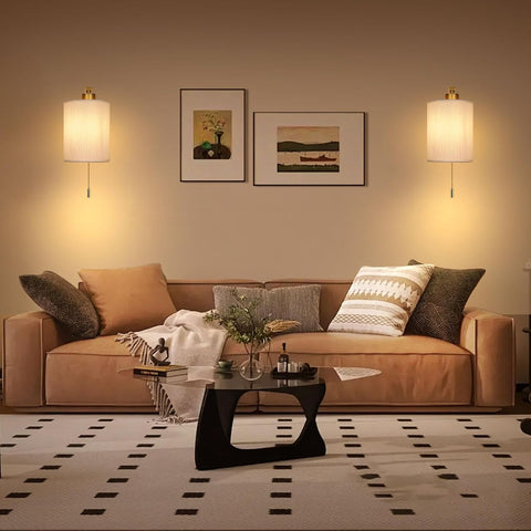 Living room with a beige sofa, coffee table, and wall art.