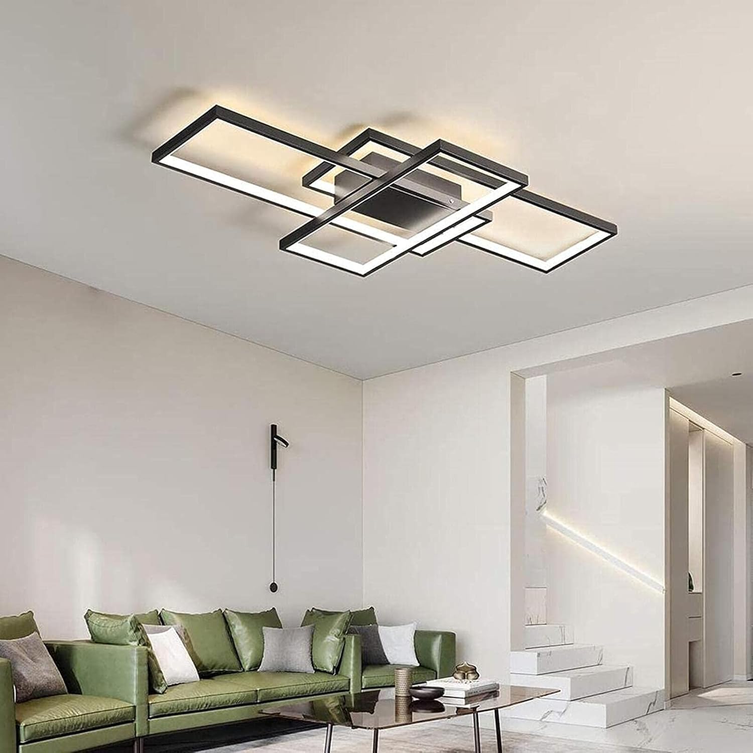 Modern living room with a stylish ceiling light fixture.
