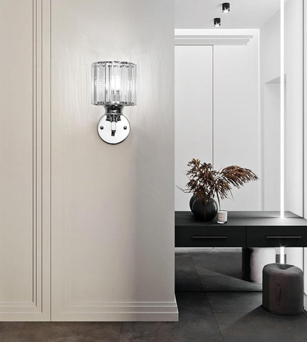 Modern wall lamp with crystal design in a stylish interior setting.