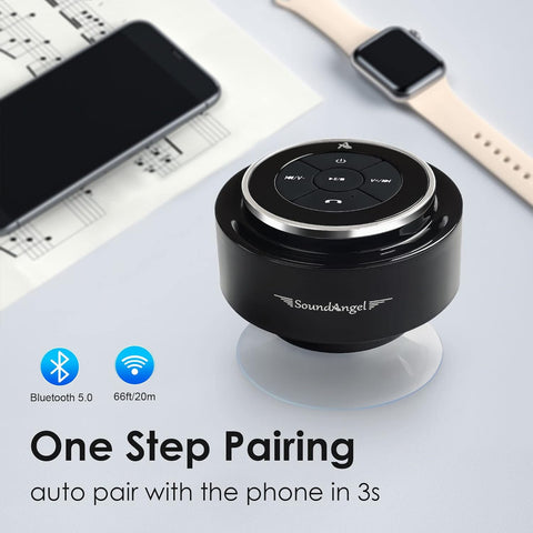 Black Bluetooth receiver with smartphone, keyboard, and smartwatch on a light gray background
