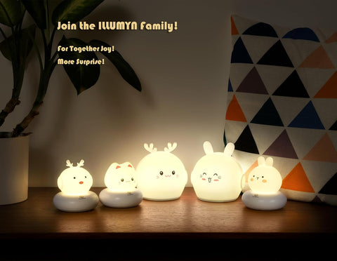 Five cartoon-style night lights on a wooden surface with text inviting viewers to join the 'ILLUMYN' family.