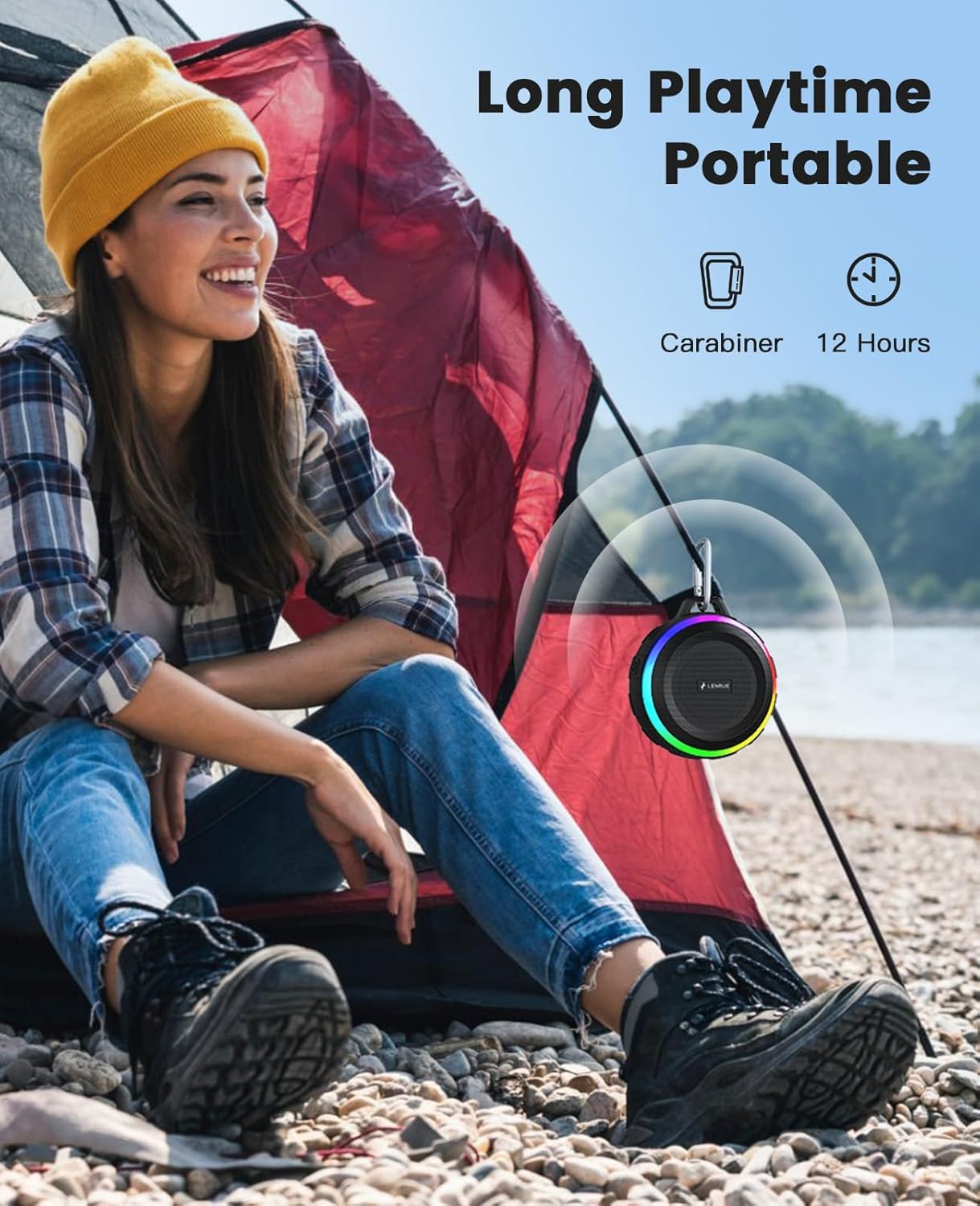 Woman sitting by a tent with a portable device and text about long playtime and portable design.