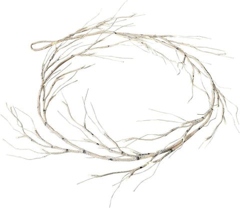 Decorative wreath made of branches on a white background