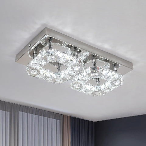 Modern ceiling light fixture with crystal-like design on a neutral background