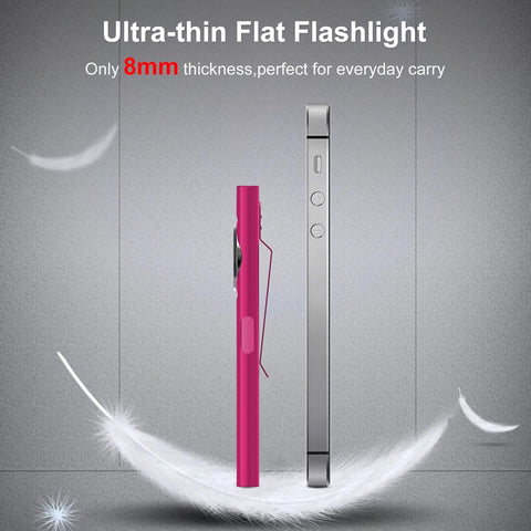 Ultra-thin flat flashlight with pink and silver design on a gray background