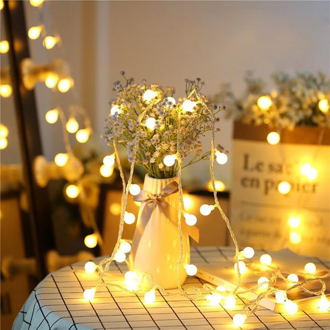 Alpha Lights 15M/49ft globe string lights on white background

