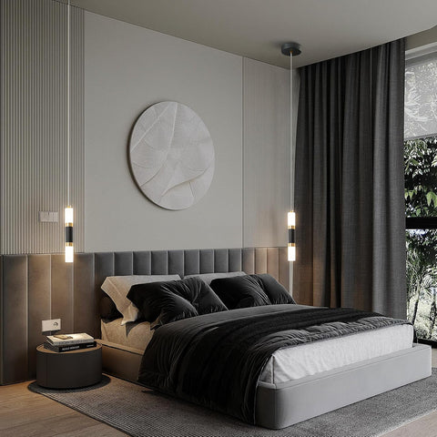 Modern bedroom with a bed, nightstands, and wall decor.