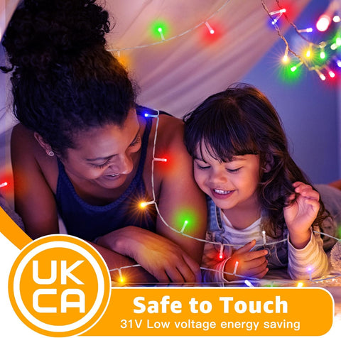 Woman and child playing with string lights, UKCA safe to touch label visible