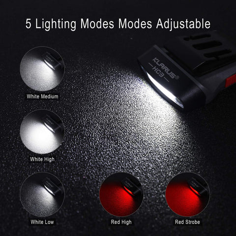 Klarus flashlight with adjustable lighting modes on a textured black surface