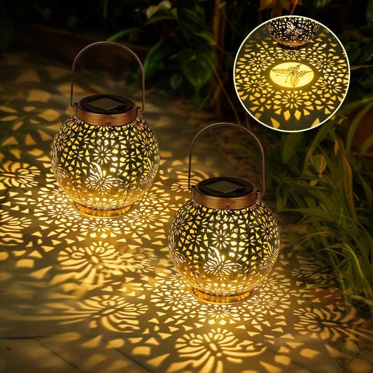 Black metal lantern with warm light glow

