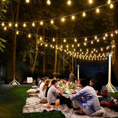 Warm white LED bulbs glowing in night scene

