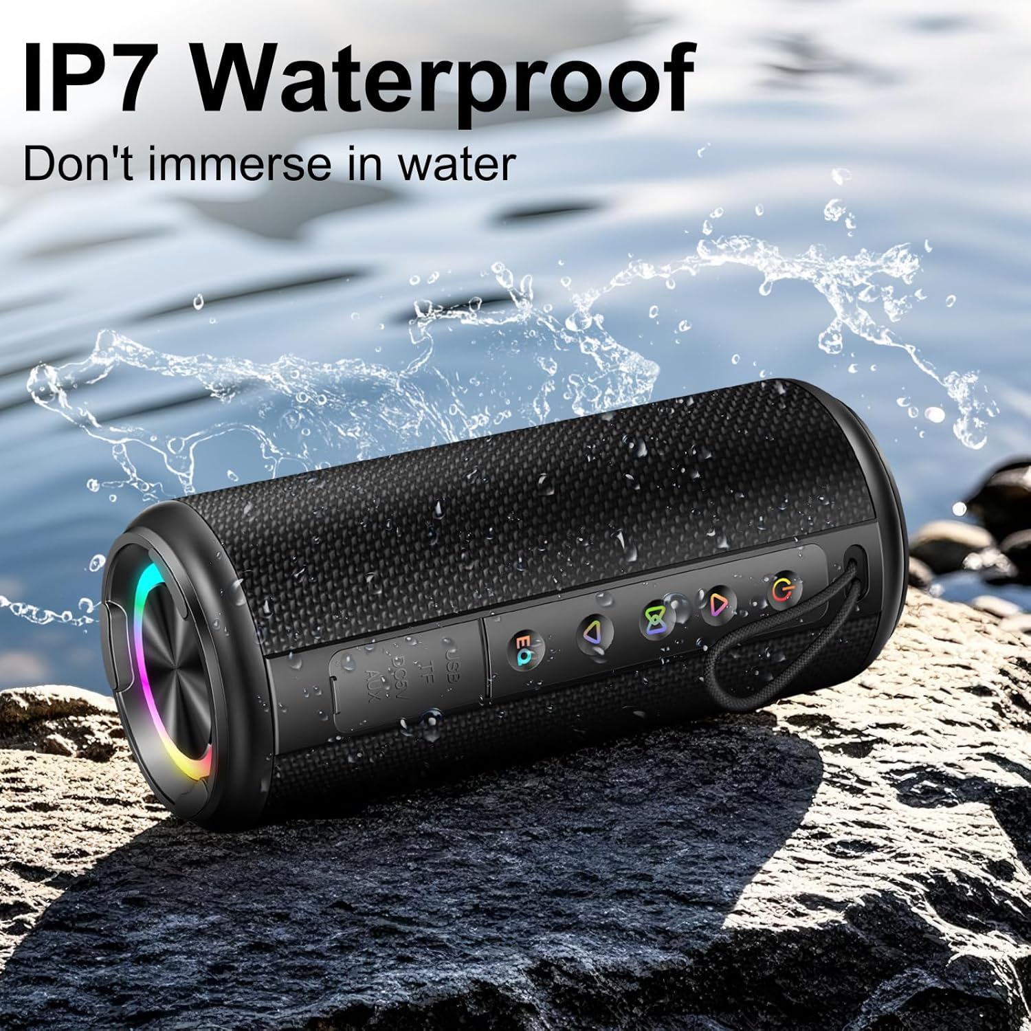 Waterproof Bluetooth speaker on a rock with water splashes, indicating its IP7 rating.
