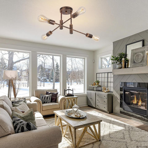 Modern living room with a fireplace, sofa, and decorative items.