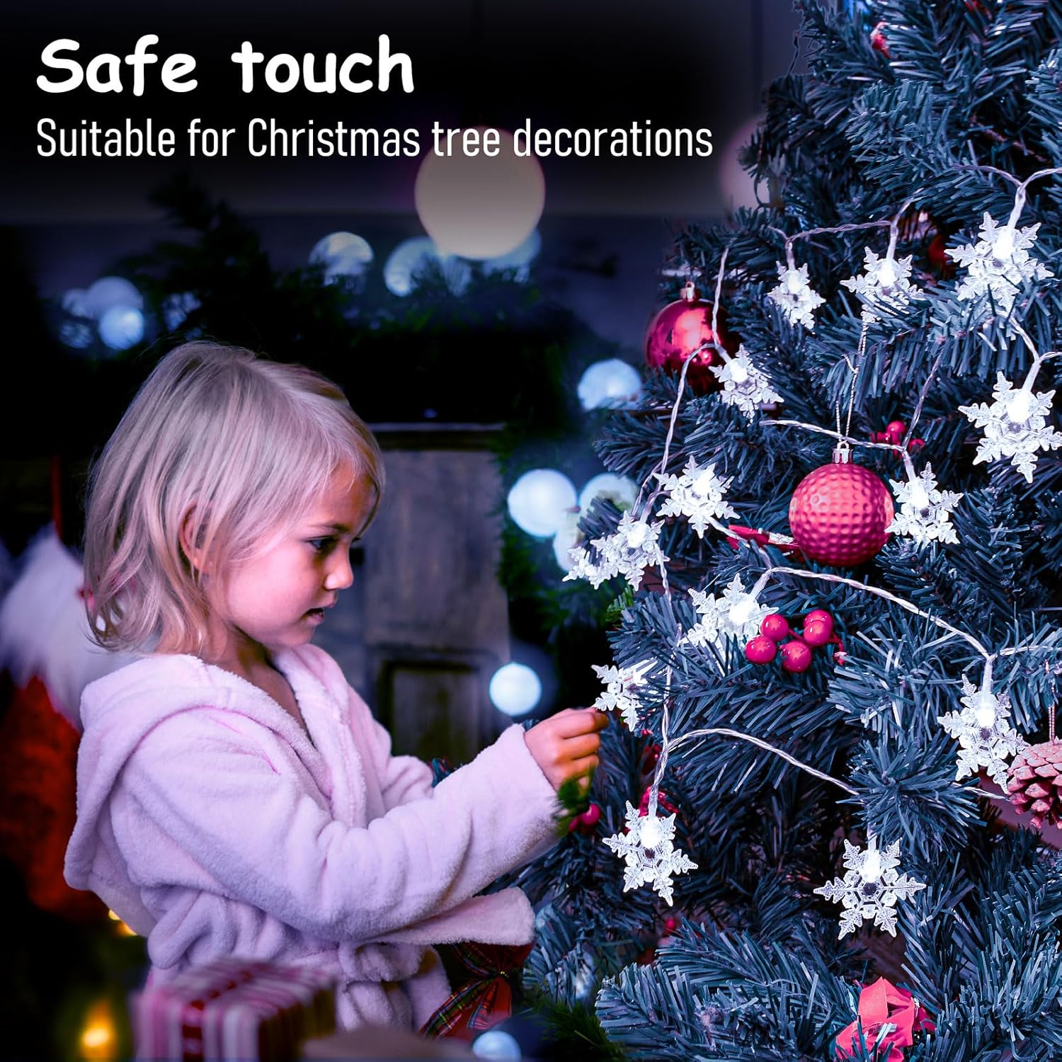 Child decorating a Christmas tree with safe touch decorations
