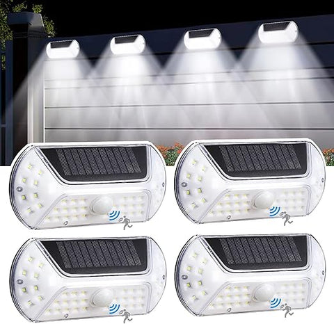 Pack of 4 Solar Powered Motion Sensor Lights installed on outdoor wall

