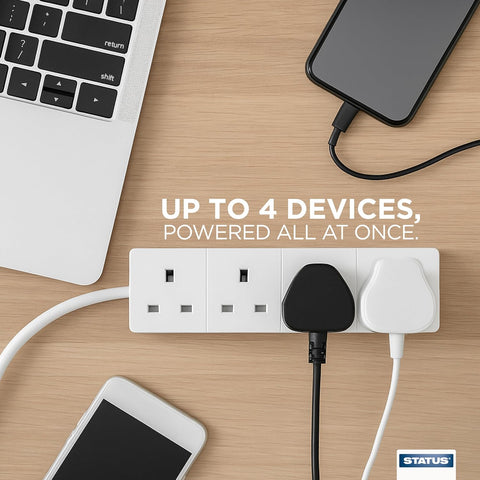 Laptop, smartphone, and power strip on a wooden surface with text 'Up to 4 devices, powered all at once.'