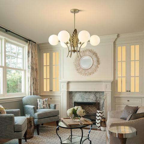 Living room with chandelier, fireplace, and decorative elements