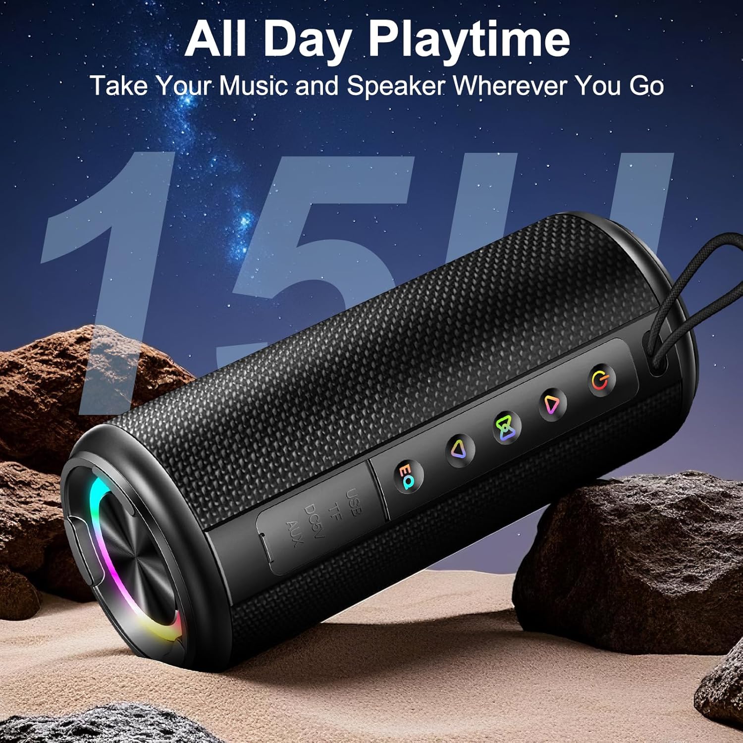 Black portable speaker with colorful lights on a rocky surface with a starry sky background