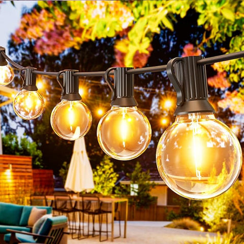 200FT LED festoon lights hanging in a garden setting.

