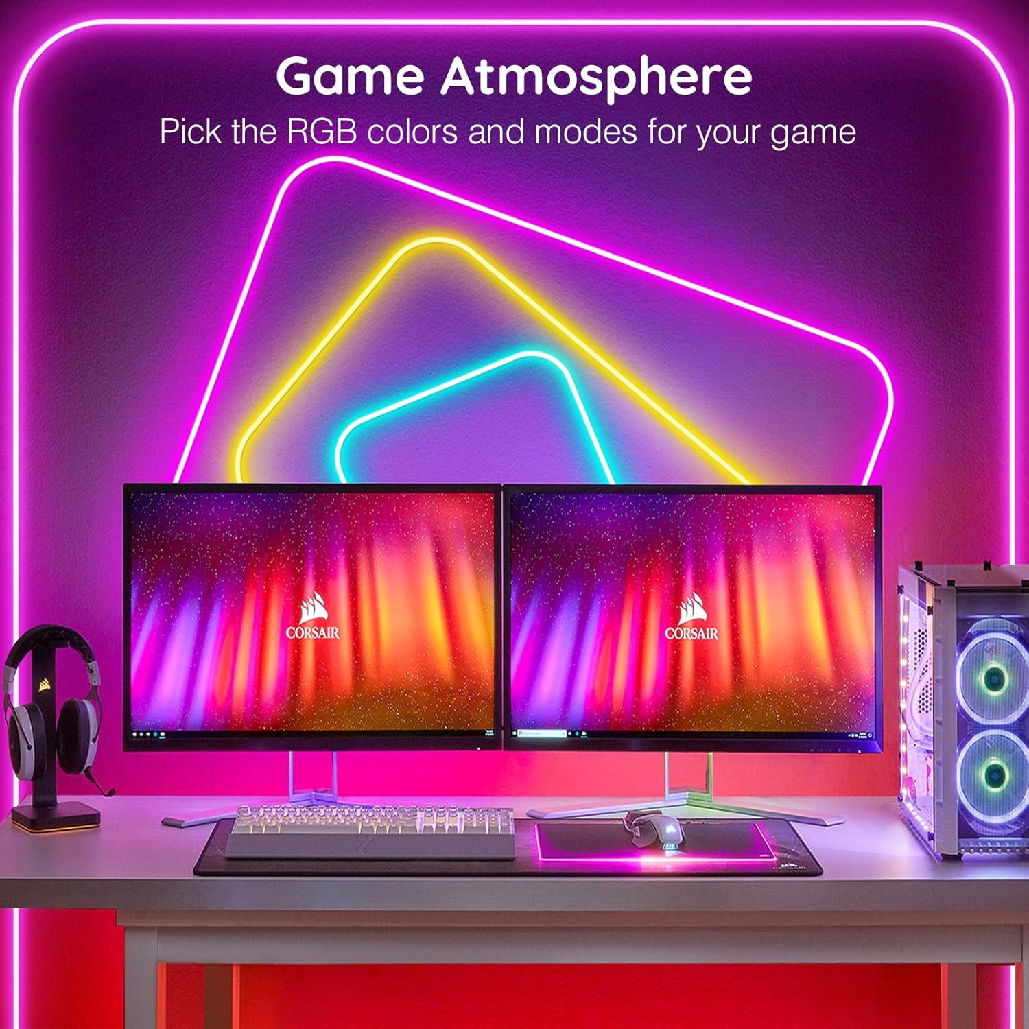 Computer setup with dual monitors, keyboard, mouse, and RGB lighting on a desk.