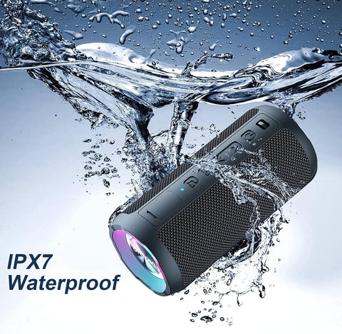 Waterproof Bluetooth speaker with water splashes around it, featuring IPX7 rating.