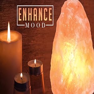 Himalayan Salt Lamp in a modern office setting, providing ambient lighting.



