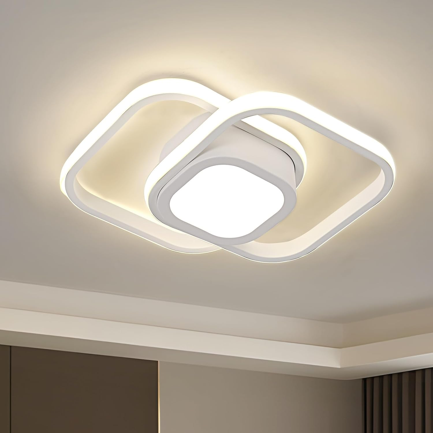 Modern ceiling light fixture on a neutral ceiling