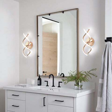 Bathroom vanity with mirror, lights, and decor