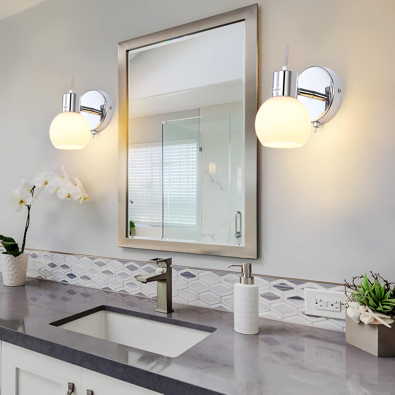 Bathroom vanity with mirror, lights, and decorative elements.