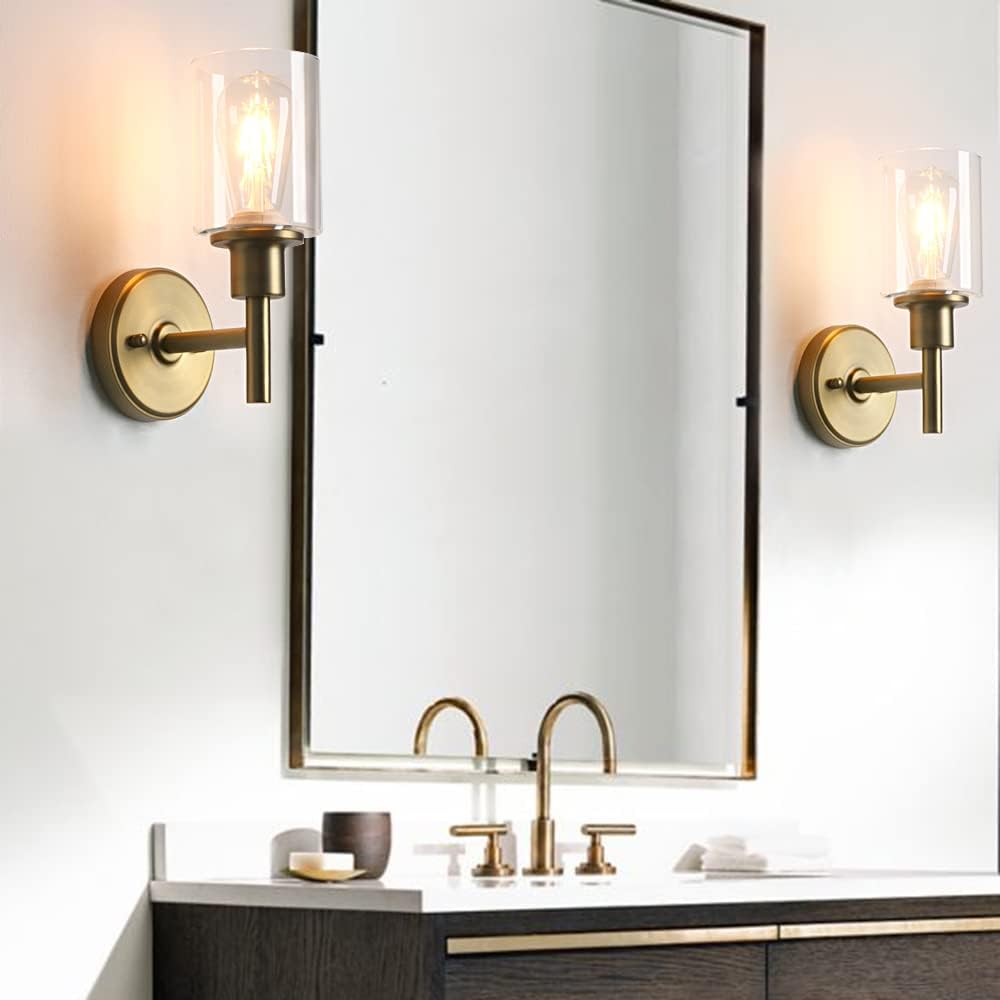 Bathroom vanity with mirror, lights, and sink fixtures.