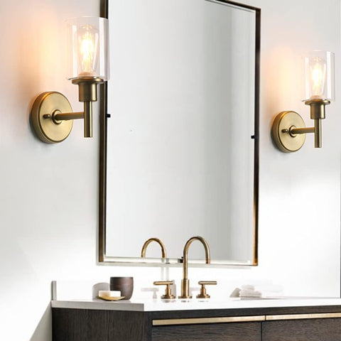 Bathroom vanity with mirror, lights, and sink fixtures.