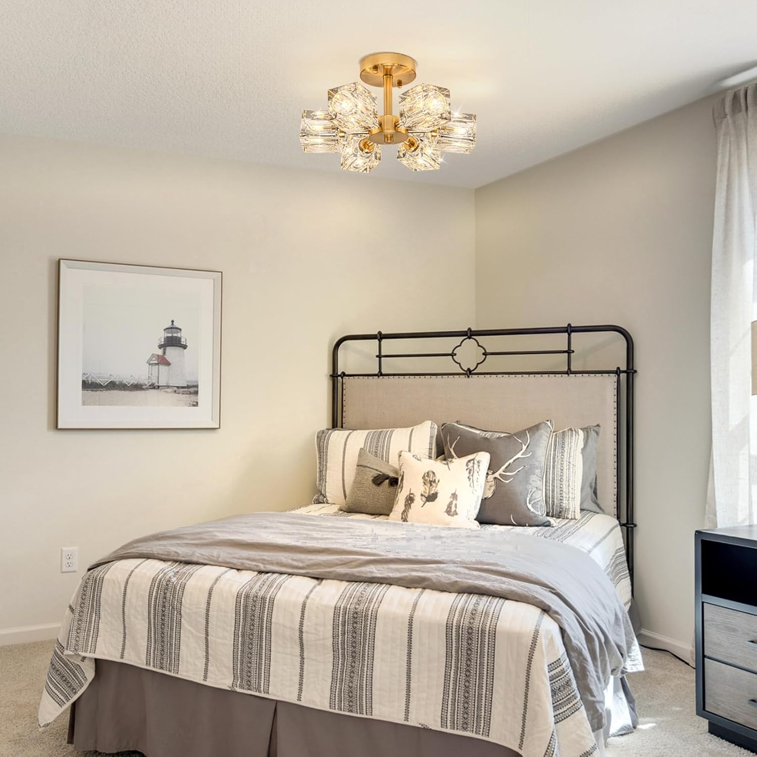 Bedroom with a bed, lamp, and decor elements
