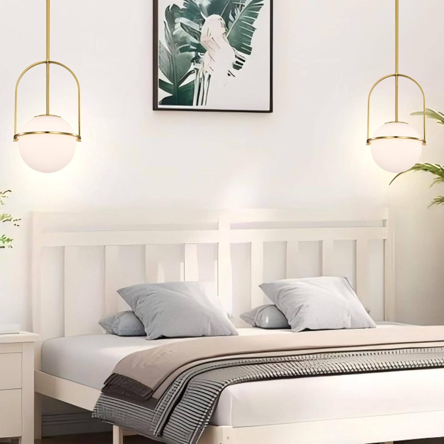 Bedroom with a white bed, light gray bedding, and gold pendant lights.