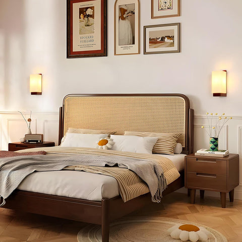 Bedroom with wooden bed, nightstands, and wall art