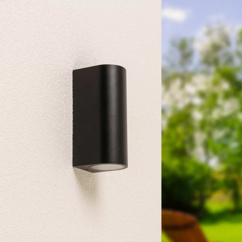 Up & Down Outdoor Wall Light installed on a terrace wall


